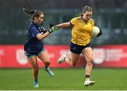 13 March 2025; Katelyn Rose Doherty of DCU Dóchas Éireann in action against Louise Coen of TUD during the 2025 AIG Moynihan Cup final match between TUD CC1 and DCU Dóchas Éireann at Queen's Sport in Belfast. Photo by Shauna Clinton/Sportsfile