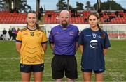 13 March 2025; Referee Eddie Cuthbert with DCU Dóchas Éireann captain Katelyn Doherty, left, and TUD captain Charlie Murray before the 2025 AIG Moynihan Cup final match between TUD CC1 and DCU Dóchas Éireann at Queen's Sport in Belfast. Photo by Shauna Clinton/Sportsfile