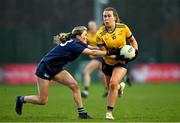 13 March 2025; Katelyn Rose Doherty of DCU Dóchas Éireann is tackled by Aine Bresnan of TUD during the 2025 AIG Moynihan Cup final match between TUD CC1 and DCU Dóchas Éireann at Queen's Sport in Belfast. Photo by Shauna Clinton/Sportsfile