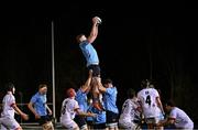 13 March 2025; Conor O'Tighearhaigh of UCD wins a line out during the annual men’s Rugby Colours match between Dublin University and UCD at UCD Bowl in Dublin. Photo by Sam Barnes/Sportsfile