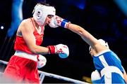 13 March 2025; Aoife O’Rourke of Ireland, left, in action against Aziza Zokirova of Uzbekistan in their 70-75kg Elite Women Quarter-Final bout during the 2025 IBA Women's World Boxing Championships quarter-finals at the Cair Sports Center in Niš, Serbia. Photo by Nikola Krstic/Sportsfile