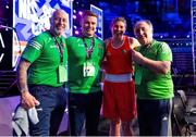 13 March 2025; Aoife O’Rourke of Ireland, celebrates with coaches, from left, Damian Kennedy, Eoin Pluck and Zaur Antia after her victory over Aziza Zokirova of Uzbekistan in their 70-75kg Elite Women Quarter-Final bout during the 2025 IBA Women's World Boxing Championships quarter-finals at the Cair Sports Center in Niš, Serbia. Photo by Nikola Krstic/Sportsfile