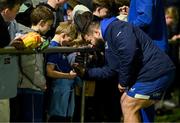 11 March 2025; Rabah Slimani signs autographs after a Leinster Rugby opening training session at St Mary's RFC on Templeville Road in Dublin. Photo by Brendan Moran/Sportsfile