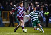 14 March 2025; Shane Farrell of Drogheda United is tackled by Dylan Watts of Shamrock Rovers during the SSE Airtricity Men's Premier Division match between Drogheda United and Shamrock Rovers at Sullivan & Lambe Park in Drogheda, Louth. Photo by Ben McShane/Sportsfile