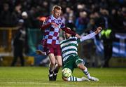 14 March 2025; Shane Farrell of Drogheda United is tackled by Dylan Watts of Shamrock Rovers during the SSE Airtricity Men's Premier Division match between Drogheda United and Shamrock Rovers at Sullivan & Lambe Park in Drogheda, Louth. Photo by Ben McShane/Sportsfile