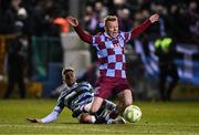 14 March 2025; Shane Farrell of Drogheda United is tackled by Dylan Watts of Shamrock Rovers during the SSE Airtricity Men's Premier Division match between Drogheda United and Shamrock Rovers at Sullivan & Lambe Park in Drogheda, Louth. Photo by Ben McShane/Sportsfile