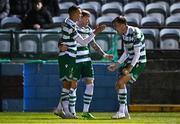 14 March 2025; Graham Burke of Shamrock Rovers, left, celebrates with teammates Danny Grant, centre, and Matt Healy after scoring their side's second goal during the SSE Airtricity Men's Premier Division match between Drogheda United and Shamrock Rovers at Sullivan & Lambe Park in Drogheda, Louth. Photo by Ben McShane/Sportsfile