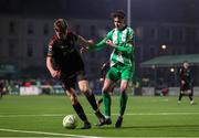 14 March 2025; Eoin Kenny of Dundalk in action against Rhys Bartley of Bray Wanderers during the SSE Airtricity Men's First Division match between Bray Wanderers and Dundalk at Carlisle Grounds in Bray, Wicklow. Photo by Thomas Flinkow/Sportsfile