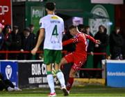 14 March 2025; Evan Caffrey of Shelbourne shoots to score his side's first goal during the SSE Airtricity Men's Premier Division match between Shelbourne and Cork City at Tolka Park in Dublin. Photo by Sam Barnes/Sportsfile