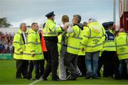 6 October 2013; Supporters, pitch security and members of An Garda Síochána during the game. FAI Ford Cup, Semi-Final, Sligo Rovers v Shamrock Rovers, The Showgrounds, Sligo. Picture credit: David Maher / SPORTSFILE