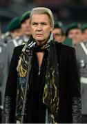 11 October 2013; Johnny Logan sings the National Anthem before the game. 2014 FIFA World Cup Qualifier, Group C, Germany v Republic of Ireland, Rhine Energie Stadion, Cologne, Germany.  Picture credit: David Maher / SPORTSFILE