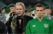 11 October 2013; Johnny Logan sings the National Anthem before the game. 2014 FIFA World Cup Qualifier, Group C, Germany v Republic of Ireland, Rhine Energie Stadion, Cologne, Germany.  Picture credit: David Maher / SPORTSFILE