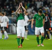 11 October 2013; Glenn Whelan, left, and Kevin Doyle, Republic of Ireland, at the end of the game. 2014 FIFA World Cup Qualifier, Group C, Germany v Republic of Ireland, Rhine Energie Stadion, Cologne, Germany. Picture credit: David Maher / SPORTSFILE