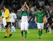 11 October 2013; Glenn Whelan, Republic of Ireland, applauds the supporters at the end of the game. 2014 FIFA World Cup Qualifier, Group C, Germany v Republic of Ireland, Rhine Energie Stadion, Cologne, Germany. Picture credit: David Maher / SPORTSFILE