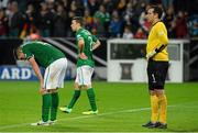 11 October 2013; Republic of Ireland players Ciaran Clark, left, Seamus Coleman, centre, and goalkeeper David Forde at the end of the game. 2014 FIFA World Cup Qualifier, Group C, Germany v Republic of Ireland, Rhine Energie Stadion, Cologne, Germany. Picture credit: David Maher / SPORTSFILE