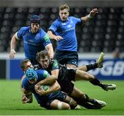 12 October 2013; Kevin McLaughlin, Leinster, is tackled by Ashley Beck, left, and Andrew Bishop, Ospreys. Heineken Cup 2013/14, Pool 1, Round 1, Ospreys v Leinster, Liberty Stadium, Swansea, Wales. Picture credit: Stephen McCarthy / SPORTSFILE