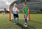 15 October 2013; More than 360 boys and girls from 42 local football teams around Ireland scored a chance to play at the Aviva Stadium today, at the McDonald’s Cup Finals, as part of the McDonald’s FAI Future Football programme. The McDonald’s Cup Final winners also took centre stage at half-time during the Republic of Ireland v Kazakhstan World Cup Qualifier in the Aviva Stadium, demonstrating their skills to the crowd! The McDonald’s Cup Finals day is part of McDonald’s FAI Future Football, a programme designed to promote the development of the game at grassroots level. McDonald’s Future Football programme has generated more than 35,000 additional hours of activity for over 4,000 children, under 8, under 9 and under 10, who have participated in the programme to date. Pictured are Megan Dunne, age 9, from Nenagh, Co. Tipperary, and Jamie Burke, age 10, from Lucan, Dublin. Aviva Stadium, Lansdowne Road, Dublin. Picture credit: Barry Cregg / SPORTSFILE