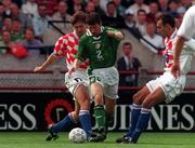 5 September 1998; Denis Irwin of Republic of Ireland in action against Robert Jarni of Croatia during the UEFA EURO 2000 Group 8 Qualifier between Republic of Ireland and Croatia at Lansdowne Road in Dublin. Photo by Brendan Moran/Sportsfile.