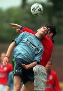 6 September 1998; Eamon McLoughlin of UCD in action against Graham Doyle of Shelbourne during the Harp Lager National League Premier Division match between UCD and Shelbourne at Belfield Park in Dublin. Photo by Matt Browne/Sportsfile.