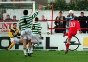 10 January 1998. Stephen Geoghegan of Shelbourne shoots to score his side's first goal depsite the efforts of Shamrock Rovers goalkeeper Tony O'Dowd during the Harp Lager League Cup First Round match between Shelbourne and Shamrock Rovers at Tolka Park in Dublin. Photo by Brendan Moran/Sportsfile.