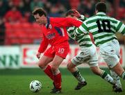 10 January 1998. Stephen Geoghegan of Shelbourne in action against Tommy Dunne, right, and Marc Kenny of Shamrock Rovers  during the Harp Lager League Cup First Round match between Shelbourne and Shamrock Rovers at Tolka Park in Dublin. Photo by Brendan Moran/Sportsfile.