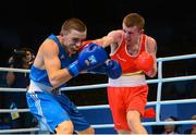 18 October 2013; Paddy Barnes, Holy Family BC, Belfast, representing Ireland, right, exchanges punches with Milos Baltic, Serbia, during their Men's Flyweight 52Kg Last 32 bout. AIBA World Boxing Championships Almaty 2013, Almaty, Kazakhstan. Photo by Sportsfile