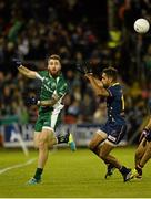 19 October 2013; Zach Tuohy, Ireland, in action against Lewis Jetta, Australia. International Rules, First Test, Ireland v Australia, Kingspan Breffni Park, Cavan. Picture credit: Barry Cregg / SPORTSFILE