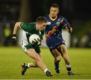 19 October 2013; Ross Munnelly, Ireland, in action against Leroy Jetta, Australia. International Rules, First Test, Ireland v Australia, Kingspan Breffni Park, Cavan. Picture credit: Barry Cregg / SPORTSFILE