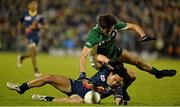 19 October 2013; Mathew Stokes, Australia, in action against Chrissy McKaigue, Ireland. International Rules, First Test, Ireland v Australia, Kingspan Breffni Park, Cavan. Picture credit: Barry Cregg / SPORTSFILE