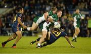 19 October 2013; Neil McGee, Ireland, holds on to the ball as team-mate Colm Boyle collides with him after being tackled by Eddie Betts, left, and Alwyn Davey, Australia. International Rules, First Test, Ireland v Australia, Kingspan Breffni Park, Cavan. Picture credit: Barry Cregg / SPORTSFILE