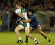 19 October 2013; Neil McGee, Ireland, in action against Tony Armstrong, Australia. International Rules, First Test, Ireland v Australia, Kingspan Breffni Park, Cavan. Picture credit: Oliver McVeigh / SPORTSFILE