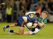 19 October 2013; Jarrod Harbrow, Australia, is tackled by Ciaran Byrne, Ireland. International Rules, First Test, Ireland v Australia, Kingspan Breffni Park, Cavan Picture credit: Oliver McVeigh / SPORTSFILE