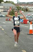 10 October 2004; Catherina McKiernan crosses the line to win the Annalee AC 10K road race. Annalee, Co. Cavan. Picture credit; Pat Murphy / SPORTSFILE