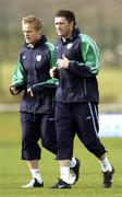 11 October 2004; Damien Duff and Robbie Keane, Republic of Ireland, warm up during squad training. Malahide FC, Malahide, Co. Dublin. Picture credit; David Maher / SPORTSFILE