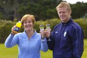 11 October 2004; Irish International Damien Duff with Jocelyn Emerson, Head of Nutritionals Marketing with GlaxoSmithKline, at a announcement of a new two-year sponsorship agreement between Damien Duff and Lucozade Sport, Irelands leading sports drink. Picture credit; Damien Eagers / SPORTSFILE