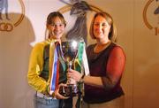 13 October 2004; Therese Maher, Ireland captain, with Miriam O'Callaghan, President of the Camogie Association, and the Eileen Dubhthaigh Ui Mhathúna cup at the launch of the 2004 Coca Cola International camogie competition between Ireland, An Bhreatain, and USA. Citywest Hotel, Dublin. Picture credit; Pat Murphy / SPORTSFILE