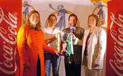 13 October 2004; At the launch of the 2004 Coca Cola International camogie competition between Ireland, An Bhreatain, and USA are, from l to r; Mo Durcan, Coca Cola Public Affairs and Communications Manager, Ann Marie O'Dwyer, An Bhreatain captain, Sean Kelly, President of the GAA, and Miriam O'Callaghan, President of the Camogie Association, with the Eileen Dubhthaigh Ui Mhathuna cup. Citywest Hotel, Dublin. Picture credit; Pat Murphy / SPORTSFILE