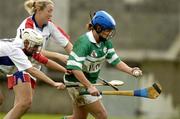 14 October 2004; Emma Linnane, Britain, in action against Sarah Kelly, front, and Mary Kirwan, USA. 2004 Coca Cola International Camogie Competition, USA v Britain, Parnell Park, Dublin. Picture credit; Damien Eagers / SPORTSFILE