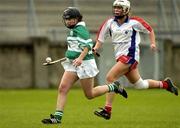 14 October 2004; Edel Reale, Britain, in action against Sarah Kelly, USA. 2004 Coca Cola International Camogie Competition, USA v Britain, Parnell Park, Dublin. Picture credit; Damien Eagers / SPORTSFILE