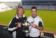 15 October 2004; Australian captain James Hird, left, and Ireland captain Padraic Joyce with the Cormac McAnallen Cup after an AFL/GAA Press Briefing ahead of this weekend's Coca Cola International Rules Series 2004. Croke Park, Dublin. Picture credit; Damien Eagers / SPORTSFILE