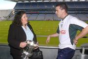 15 October 2004; Bridget McAnallen in conversation with Ireland captain Padraic Joyce while holding the cup which is named after her late son Cormac McAnallen after a joint AFL/GAA Press Briefing ahead of this weekend's Coca Cola International Rules Series 2004. Croke Park, Dublin. Picture credit; Damien Eagers / SPORTSFILE