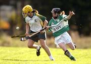 15 October 2004; Aisling Fahey, Ireland, in action against Criona Harrington, Britain. 2004 Coca Cola International Camogie Competition, Ireland v Briatin, St. Brigids GAA Club, Dublin. Picture credit; Matt Browne / SPORTSFILE