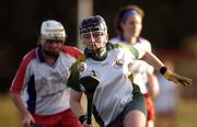 15 October 2004; Marie Keating, Ireland, in action against Sarah Kelly, USA. 2004 Coca Cola International Camogie Competition, Ireland v USA, St. Brigids GAA Club, Dublin. Picture credit; Matt Browne / SPORTSFILE