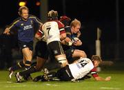 15 October 2004; Des Dillon, Leinster, is tackled by the Ospreys defence. Celtic League 2004-2005, Neath / Swansea Ospreys v Leinster, St. Helens, Wales. Picture credit; Tim Parfitt / SPORTSFILE