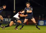 15 October 2004; Brian O'Driscoll, Leinster, is tackled by Sonny Parker, Ospreys. Celtic League 2004-2005, Neath / Swansea Ospreys v Leinster, St. Helens, Wales. Picture credit; Tim Parfitt / SPORTSFILE