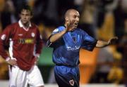 15 October 2004; Tony Grant, Bohemians, celebrates after scoring his sides first goal as Shelbourne's Jamie Harris looks on. eircom league, Premier Division, Shelbourne v Bohemians, Tolka Park, Dublin. Picture credit; Brian Lawless / SPORTSFILE
