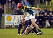 16 October 2004; Neil Robertson, Scotland, in action against James Young, Ireland. Senior Mens Hurling Shinty International, Ireland v Scotland, Rathoath GAA Club, Phairc Sean Eiffe, Co. Meath. Picture credit; Damien Eagers / SPORTSFILE