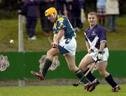 16 October 2004; John M Dooley, Ireland, in action against Douglas Dando, Scotland. Senior Mens Hurling Shinty International, Ireland v Scotland, Rathoath GAA Club, Phairc Sean Eiffe, Co. Meath. Picture credit; Damien Eagers / SPORTSFILE