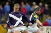 16 October 2004; Andrew Mitchell, Ireland, in action against Harry McDonald, Scotland. Senior Mens Hurling Shinty International, Ireland v Scotland, Rathoath GAA Club, Phairc Sean Eiffe, Co. Meath. Picture credit; Damien Eagers / SPORTSFILE