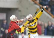 17 October 2004; Paul Codd, Rathnure, is tackled by Martin Storey, Oulart-the-Ballagh. Wexford Senior Hurling Final, Rathnure v Oulart-the-Ballagh, Wexford Park, Co. Wexford. Picture credit; Matt Browne / SPORTSFILE